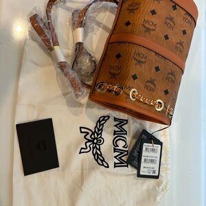 MCM Tan Backpack with Gold Details Authentic